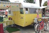 Very clean classic 1957 Shasta travel trailer in yellow and white